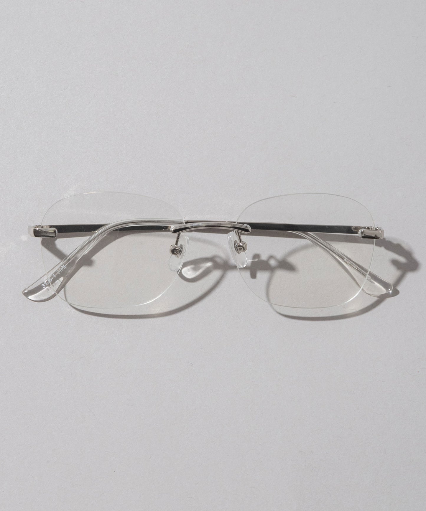 リムレススクエア伊達メガネ