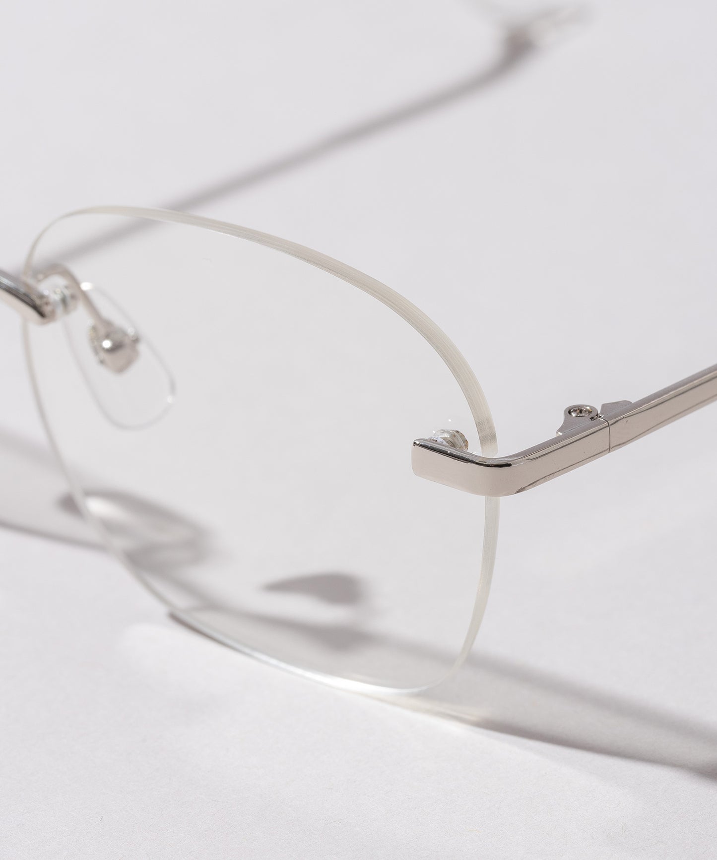 リムレススクエア伊達メガネ