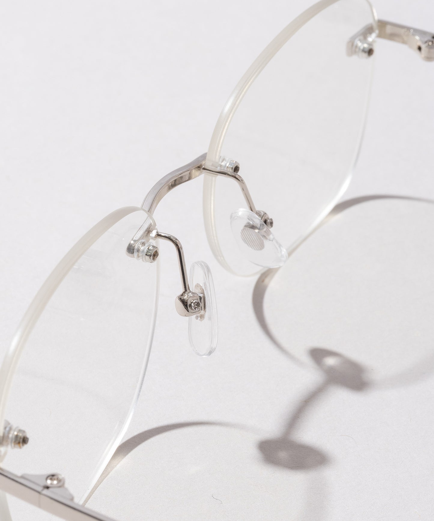 リムレススクエア伊達メガネ